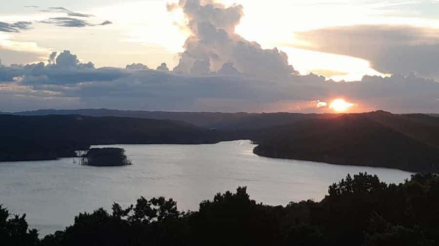 Flores: Yaxha Shared Sunset Tour with Transportation & Guide - Visitor Center stop: tickets, wristbands, and park entry