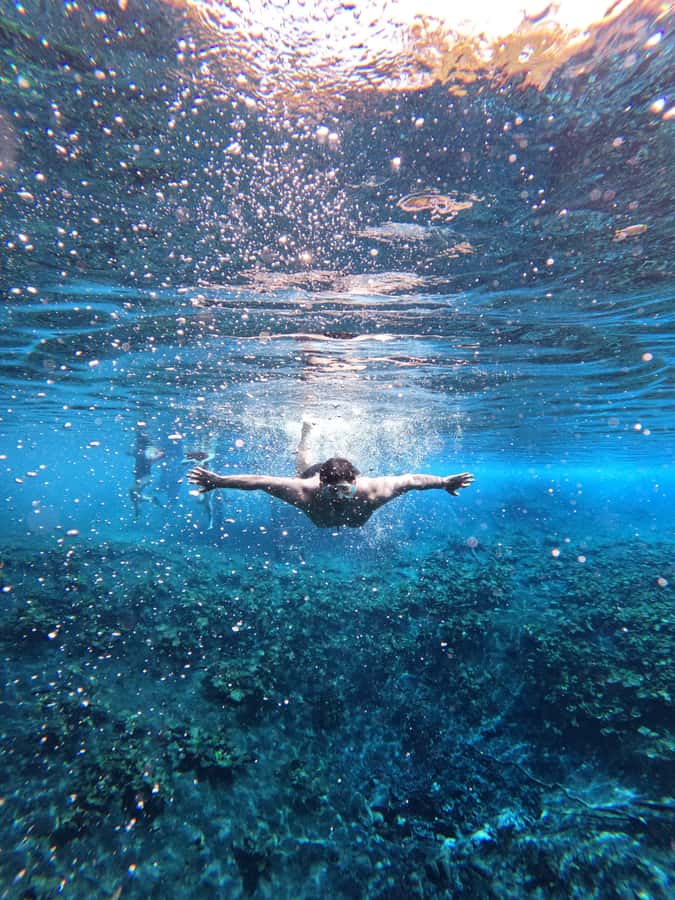 From Flores: Blue Crater All Inclusive - Arroyo Pucte bus ride, then a short boat hop to Crater Azul