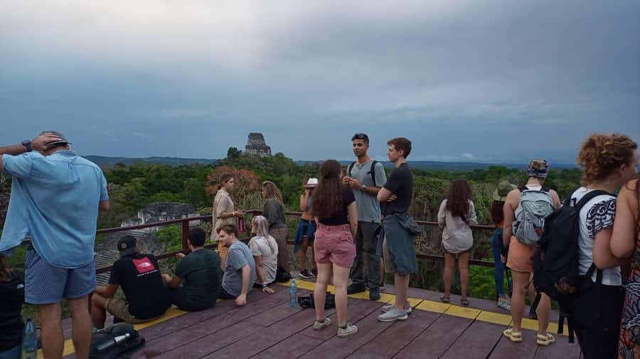 From Flores: Tikal Guided Tour with Transportation - The Walk Begins: Temple I, Temple II, and the Heart of the Plaza