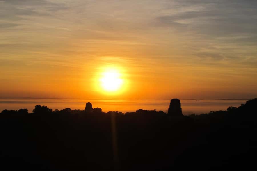 From Flores: Tikal Ruins Sunrise Guided Tour - Sunrise from Flores to Tikal, why it works