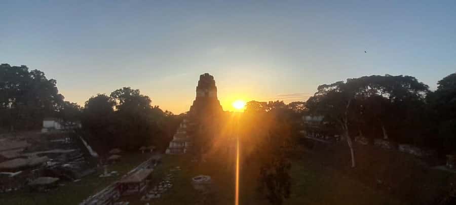 From Flores: Tikal Sunset Tour - Lost World pyramid climb: the 360-degree sunset viewpoint