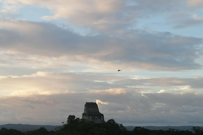 Tikal VIP Private Sunset Tour from Flores Guatemala - The Lost World pyramid sunset moment and how to plan for photos